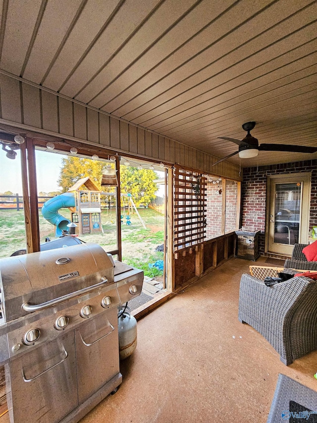 exterior space featuring grilling area and a playground