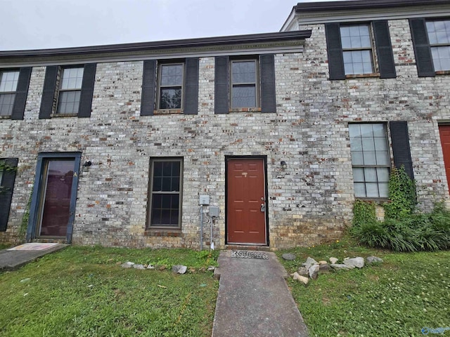 2005 Reaches Pl Unit B, Huntsville, AL 35802 - multi unit property with brick siding and a front lawn
