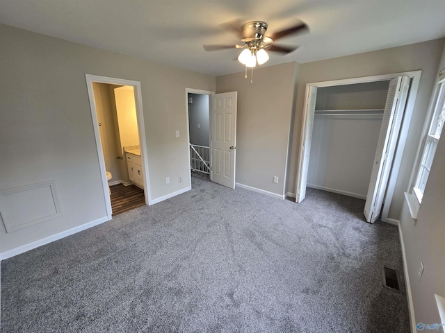 2005 Reaches Pl Unit B, Huntsville, AL 35802 - unfurnished bedroom featuring carpet flooring, baseboards, a closet, a ceiling fan, and ensuite bathroom