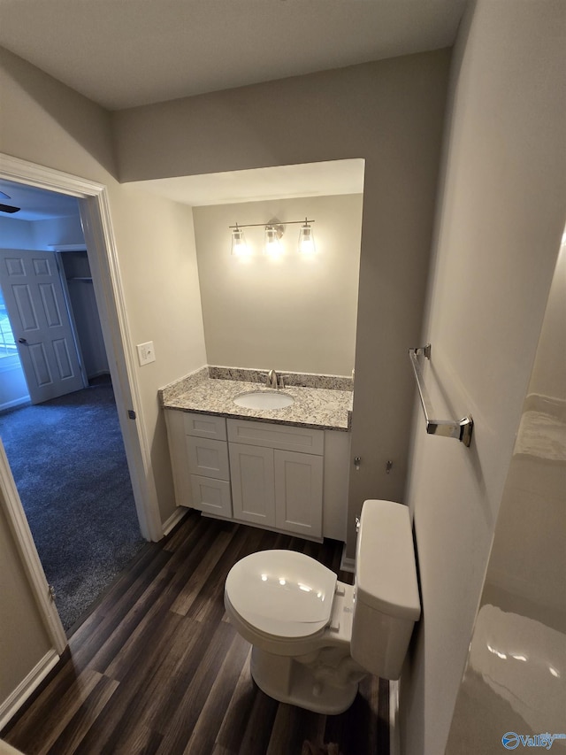 2005 Reaches Pl Unit B, Huntsville, AL 35802 - bathroom with toilet, vanity, wood finished floors, and baseboards