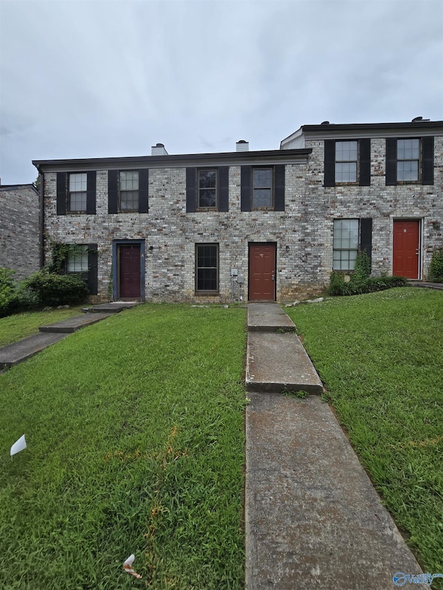 2005 Reaches Pl Unit B, Huntsville, AL 35802 - view of front of house featuring a front yard