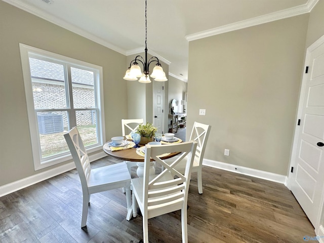 dining area with dark wood-style floors, ornamental molding, and baseboards