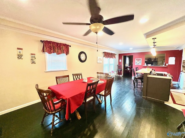 dining room featuring ornamental molding, dark hardwood / wood-style floors, and ceiling fan