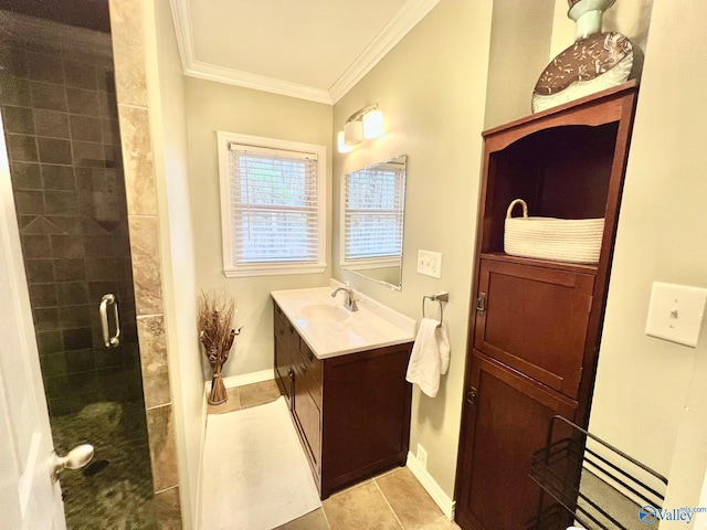 bathroom featuring crown molding, walk in shower, tile patterned flooring, and vanity