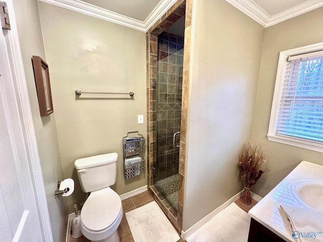 bathroom with vanity, ornamental molding, an enclosed shower, toilet, and tile patterned floors