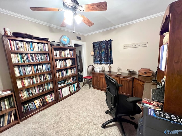 home office featuring light carpet, crown molding, and ceiling fan