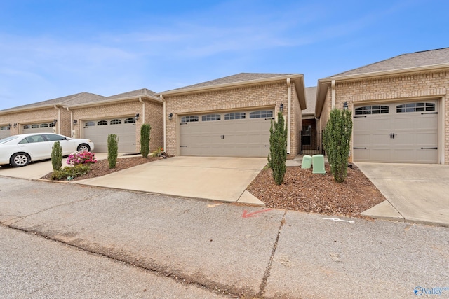 ranch-style home featuring a garage