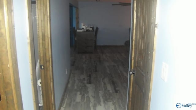 hall with dark hardwood / wood-style floors