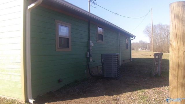 view of property exterior with cooling unit