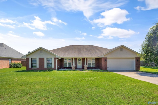 single story home with a garage and a front lawn