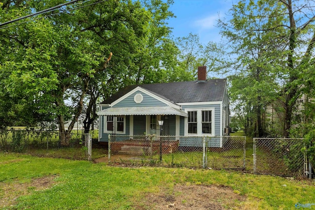 bungalow-style home with a gate, a chimney, a fenced front yard, and a front yard
