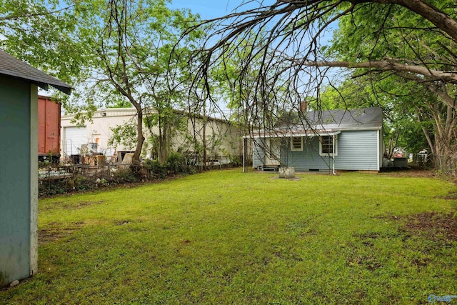 view of yard with fence