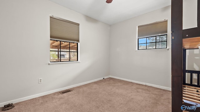 17395 County Road 31, Centre, AL 35960 - carpeted empty room with plenty of natural light, visible vents, baseboards, and ceiling fan