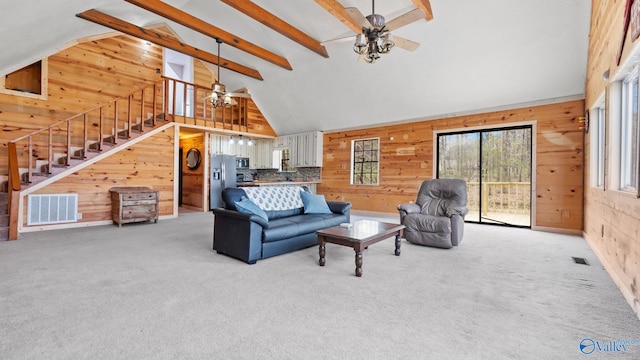 17395 County Road 31, Centre, AL 35960 - living area featuring ceiling fan, stairs, and wood walls