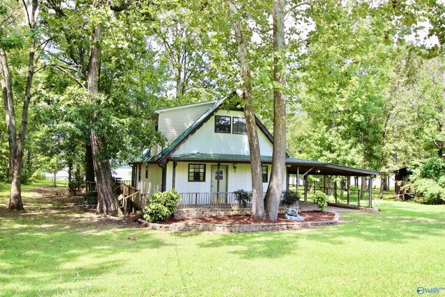 17395 County Road 31, Centre, AL 35960 - view of front of property with an attached carport, covered porch, and a front lawn
