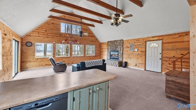 17395 County Road 31, Centre, AL 35960 - kitchen featuring a ceiling fan, open floor plan, wood walls, carpet flooring, and dishwasher