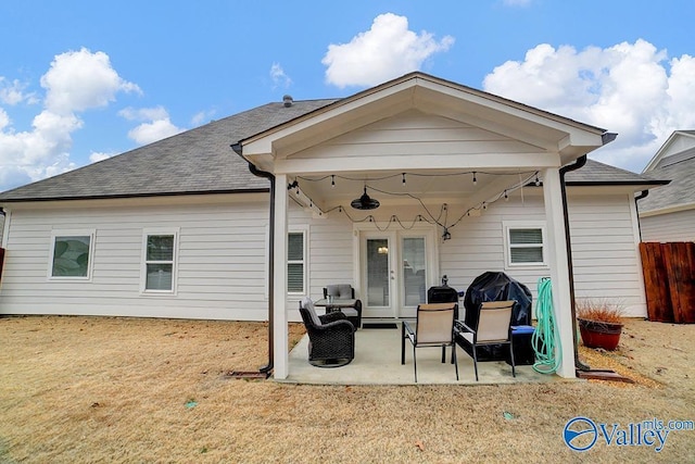 back of property featuring a patio area