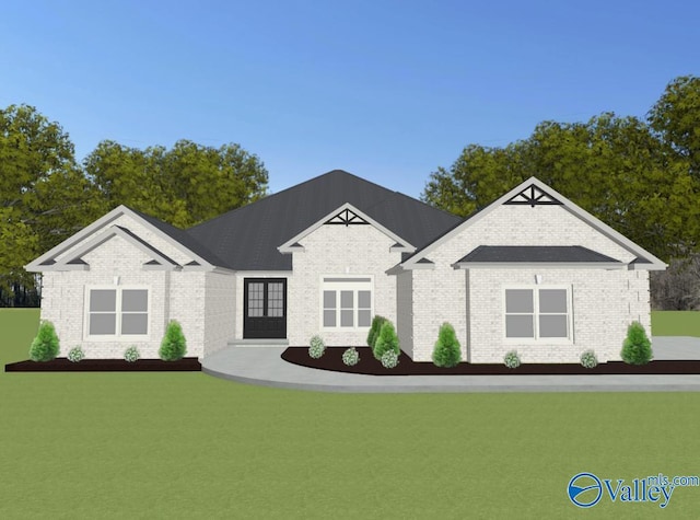 view of front of home featuring brick siding and a front yard