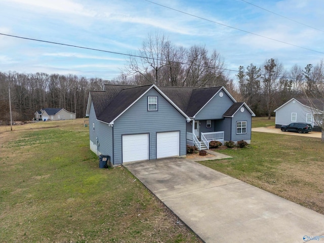 view of front of home featuring a garage and a front yard