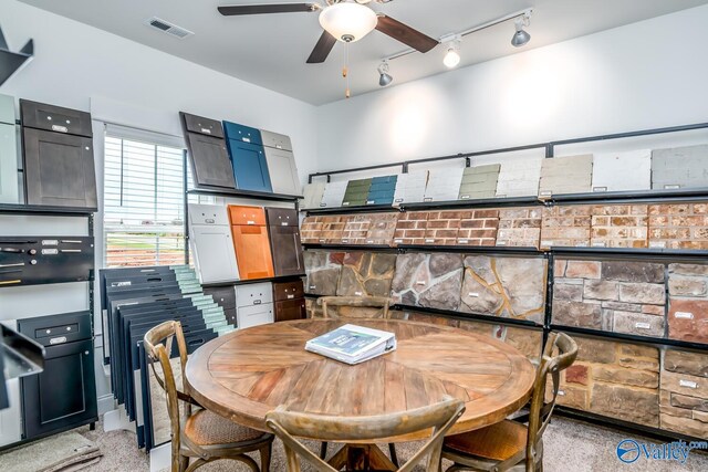 dining room featuring ceiling fan