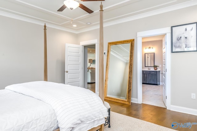 bedroom featuring ensuite bath, ceiling fan, and hardwood / wood-style floors