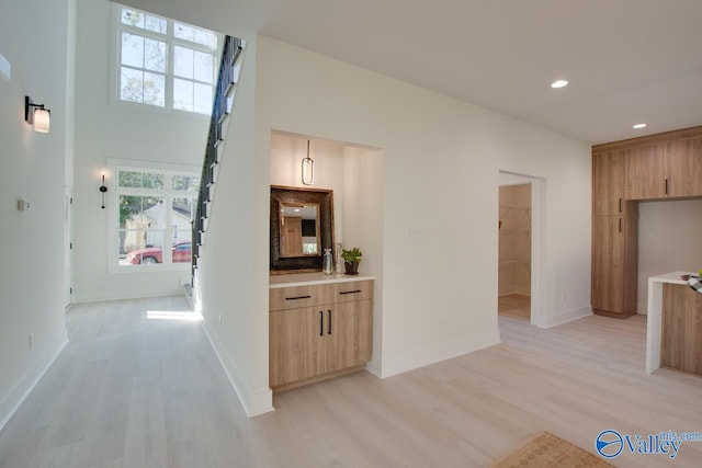 hallway featuring light hardwood / wood-style floors