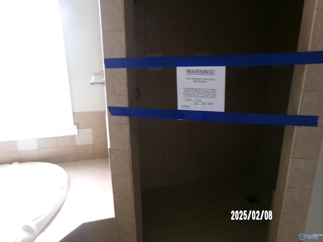 bathroom featuring tile patterned flooring