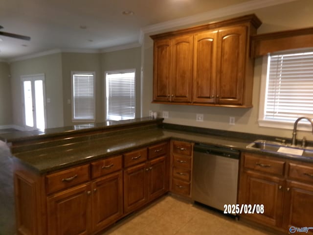 kitchen featuring stainless steel dishwasher, ornamental molding, sink, and light tile patterned floors