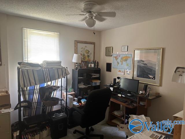 3613 Mcvay St, Huntsville, AL 35805 - carpeted office space featuring ceiling fan and a textured ceiling