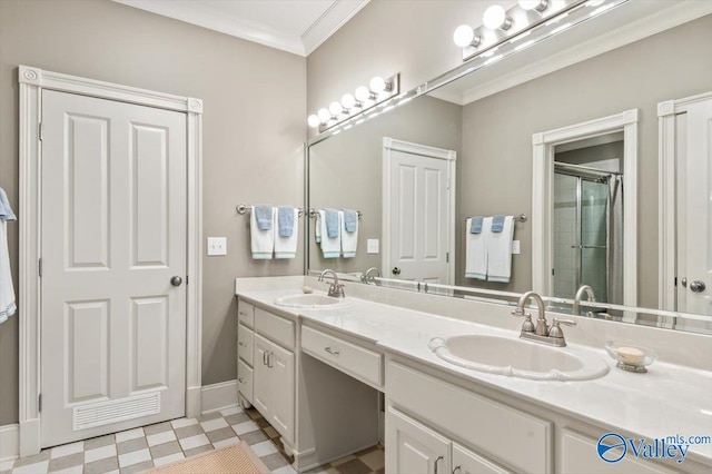 full bath with tile patterned floors, a sink, ornamental molding, and a stall shower
