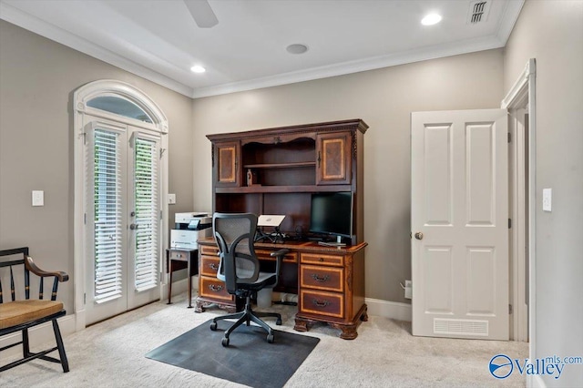office space featuring visible vents, crown molding, baseboards, and light carpet