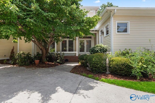 property entrance with french doors
