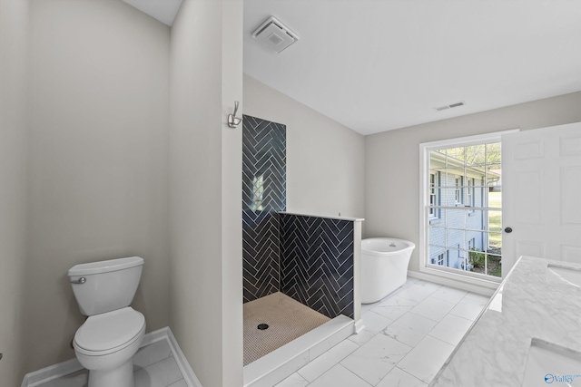 bathroom with marble finish floor, toilet, visible vents, and tiled shower