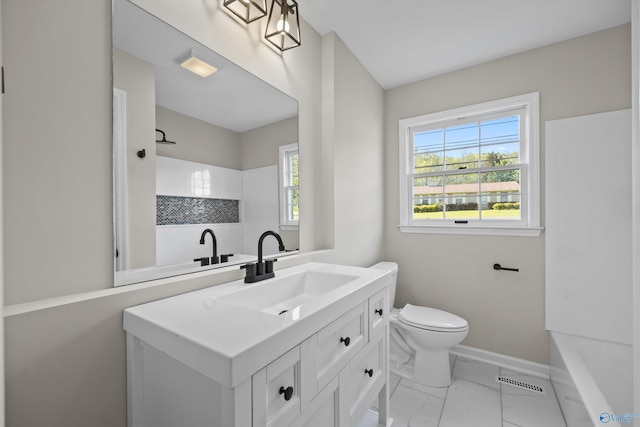 full bath featuring marble finish floor, toilet, vanity, baseboards, and walk in shower