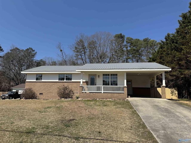 ranch-style house with crawl space, an attached carport, concrete driveway, and brick siding