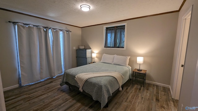 bedroom featuring dark hardwood / wood-style flooring and a textured ceiling