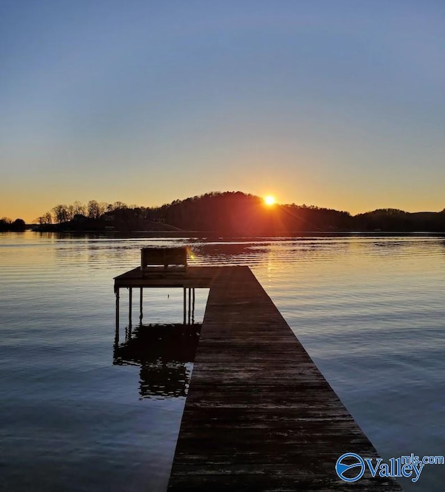 view of dock featuring a water view