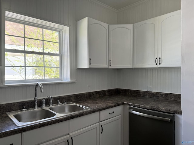 kitchen featuring crown molding, a wealth of natural light, white cabinets, dishwasher, and sink