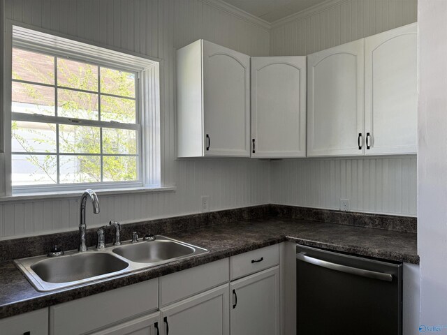 kitchen with white cabinetry, dishwashing machine, and sink