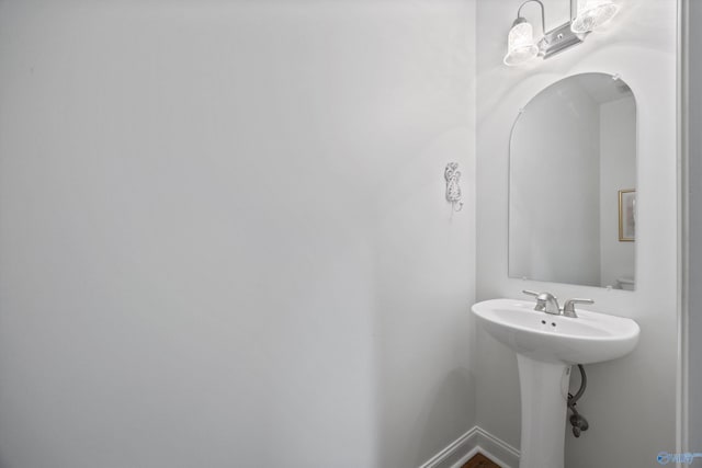 bathroom featuring baseboards