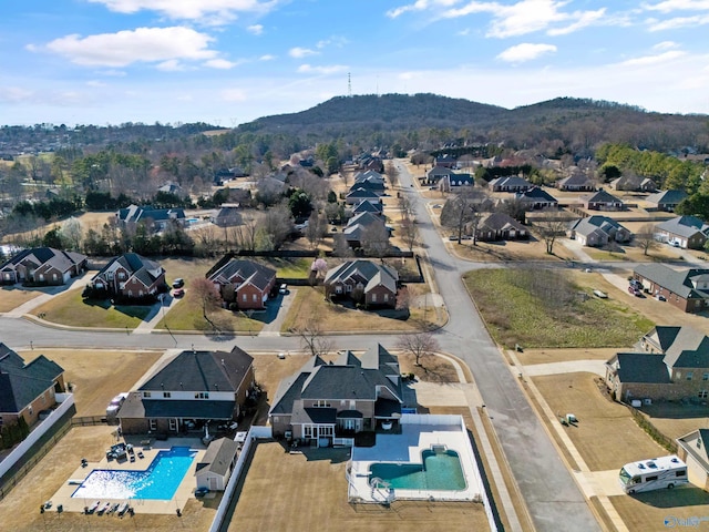 drone / aerial view with a residential view and a mountain view