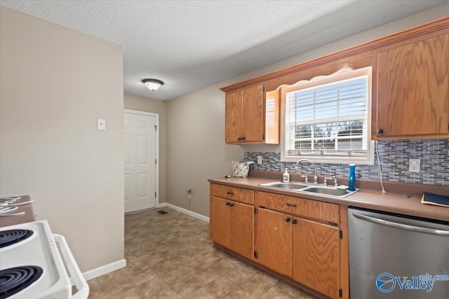 kitchen featuring brown cabinets, tasteful backsplash, a sink, dishwasher, and baseboards