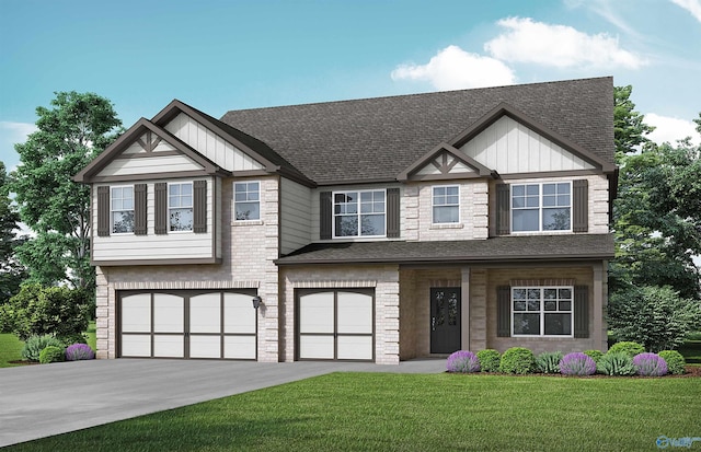 view of front of house with a front yard and a garage