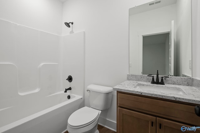 full bathroom featuring shower / bath combination, hardwood / wood-style flooring, vanity, and toilet