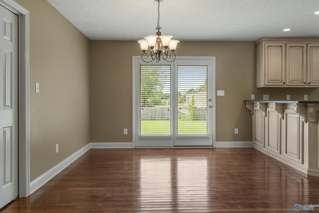 16121 Kyle Moran Dr, Athens, AL 35614 - unfurnished dining area with wood finished floors, a chandelier, baseboards, and recessed lighting