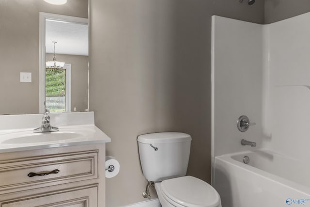 16121 Kyle Moran Dr, Athens, AL 35614 - bathroom with toilet, a chandelier, vanity, shower / bath combination, and baseboards