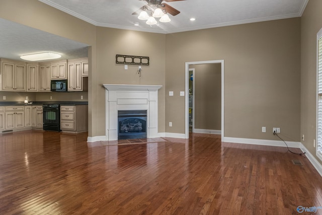 16121 Kyle Moran Dr, Athens, AL 35614 - unfurnished living room with ceiling fan, wood finished floors, crown molding, a fireplace with flush hearth, and baseboards
