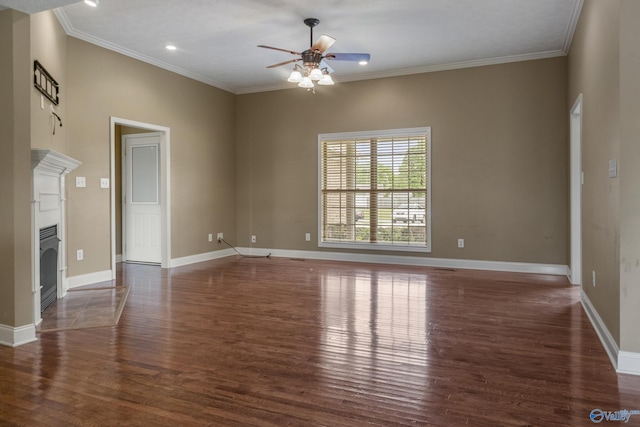 16121 Kyle Moran Dr, Athens, AL 35614 - spare room with ceiling fan, wood finished floors, a fireplace with flush hearth, baseboards, and ornamental molding