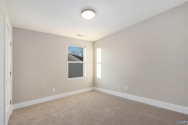 view of carpeted spare room