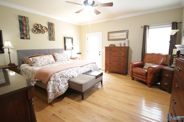 bedroom featuring ceiling fan, crown molding, and light hardwood / wood-style flooring